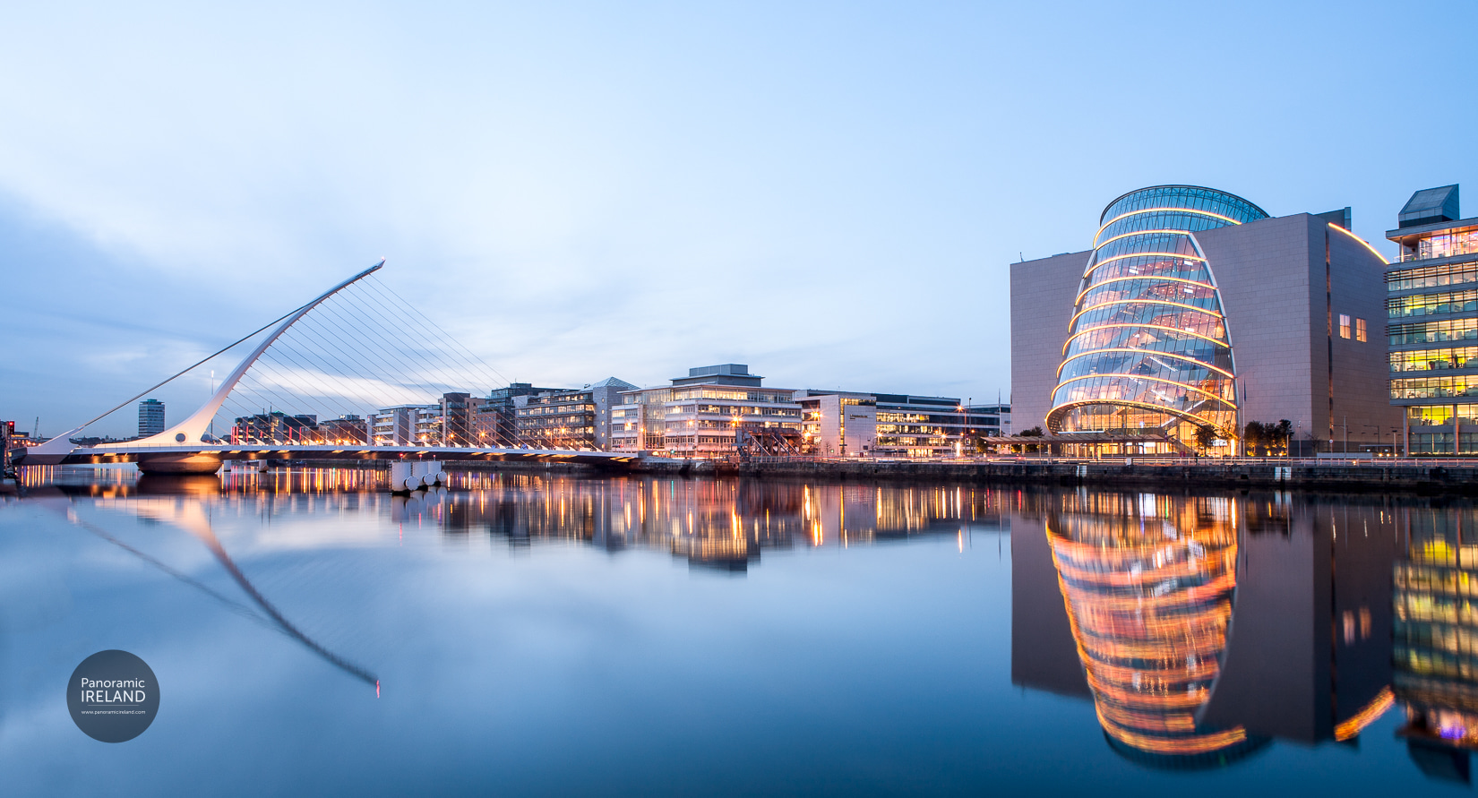 Samuel Beckett Bridge and Convention Centre reflected in the River Liffey at dusk, Dublin — photography by Panoramic Ireland