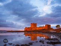 Carrickfergus Castle aglow in sunlight